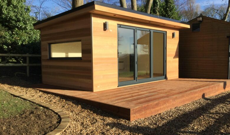 5 x 3 Premier Studio, clad in Cedar with aluminium bi-fold doors and extra windows